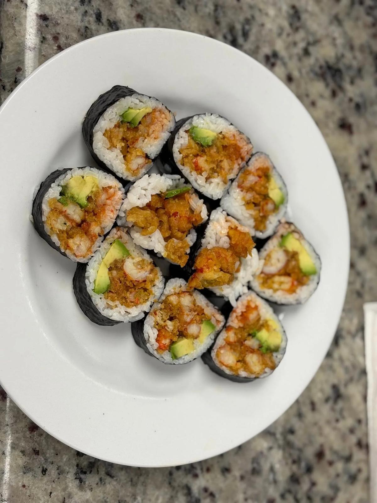 A plate of sushi rolls