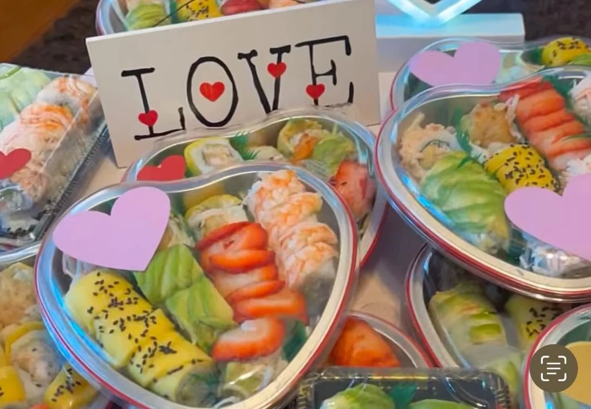 Valentine's sushi boxes with LOVE signs